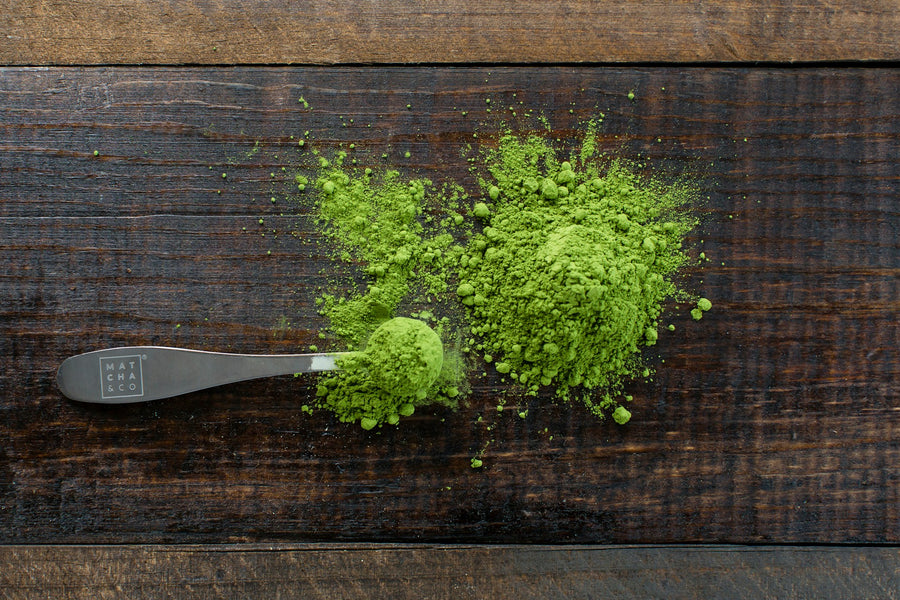 green powder and scoop on a board|green powder and scoop on a board